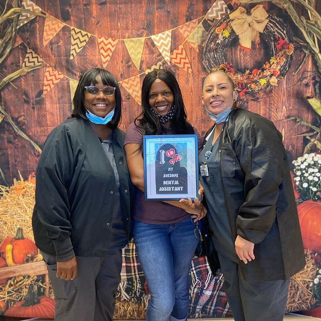 Three dental assistants from Bellflower Dental Group.